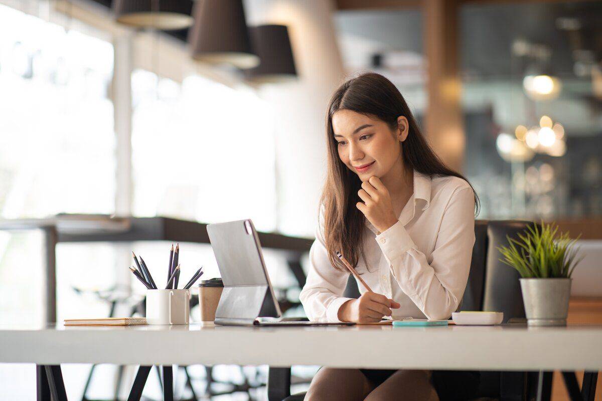 young asian women doing video call with insurance broker